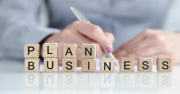 Texto do plano de negócios e agenda de planejamento. Melhores práticas de business intelligence e conceito de planejamento bem-sucedido - Filmagem, Vídeo