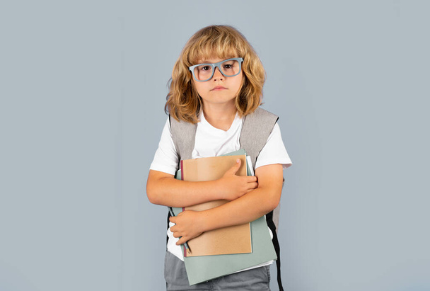 School child on isolated background. Kids education, Learning studying and knowledge for children - Foto, Bild