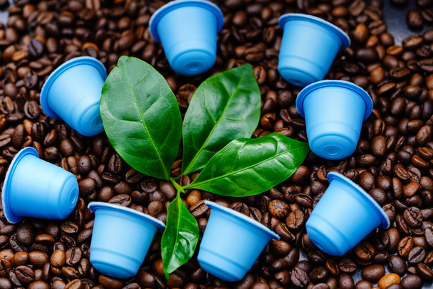 some leaves of a coffee plant roasted Coffee beans - 写真・画像