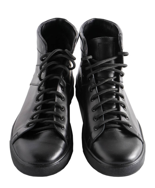 New black boots isolated on white background. Fashion footwear. Laces. Autumn winter and spring accessory. Convenient and comfortable casual shoes. A pair of low-speed boots. - 写真・画像