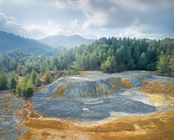 Ore stockpiles at abandoned Mala pyrite mine in Paphos forest, Cyprus - Foto, imagen