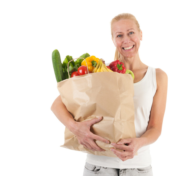 Mulher com legumes e frutas saudáveis
 - Foto, Imagem