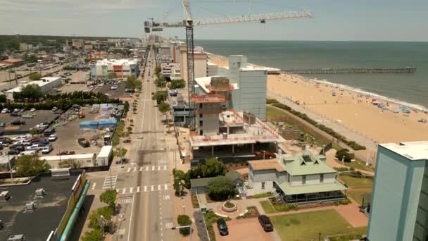Aerial footage Moxy Hotel under construction Virginia Beach VA USA Circa June 2022 - Materiał filmowy, wideo