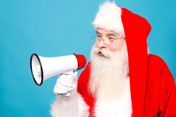 Santa claus making announcement - Foto, Bild