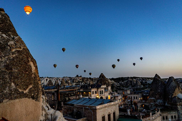 A view of the hot air balloons in the sky over beautiful Cappadocia, Turkey - Foto, imagen