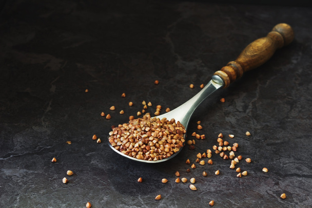 buckwheat in an old spoon - Foto, Imagem