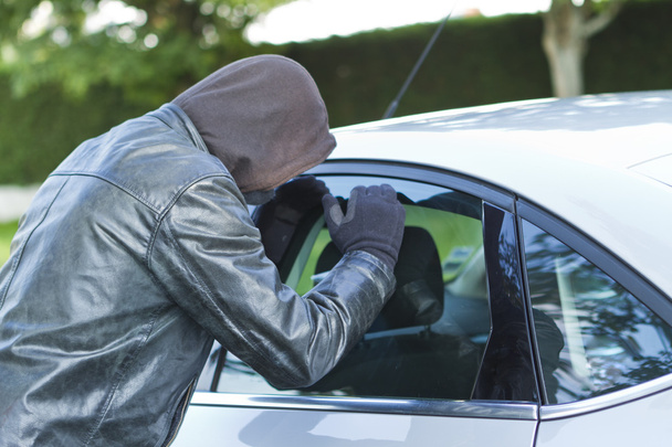 Thief stealing a car - Fotoğraf, Görsel