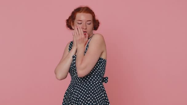 Scared fearful young redhead woman terrified about danger problems, suffering phobia, anxiety disorder, expresses fear, waving no, insecure, stress, panic. Ginger girl with freckles on pink background - Záběry, video