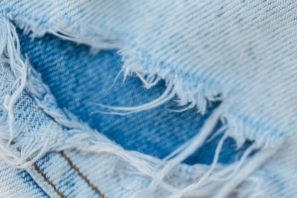 Ripped jeans, close-up. Fashion denim torn pants - Photo, Image