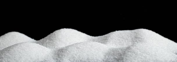 Fluffy white snow hills on black background. Salt crystals posing as snow texture.  - Zdjęcie, obraz