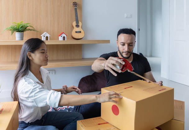 Small business owners, online stores, sellers, entrepreneurs, packaging, post, shipping, boxes, preparing parcels on the table. Ecommerce dropshipping service concept. - Photo, image
