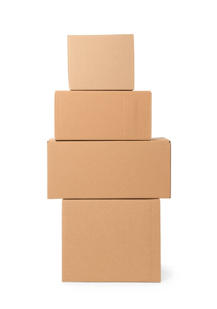 Many closed cardboard boxes on white background. Delivery service - Photo, Image