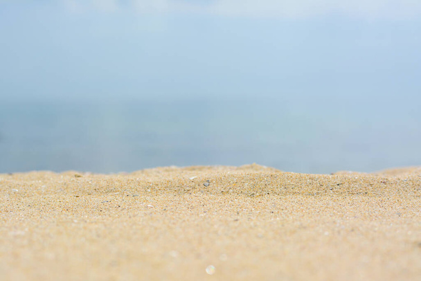 Beautiful beach with golden sand near sea, closeup view. - Photo, Image