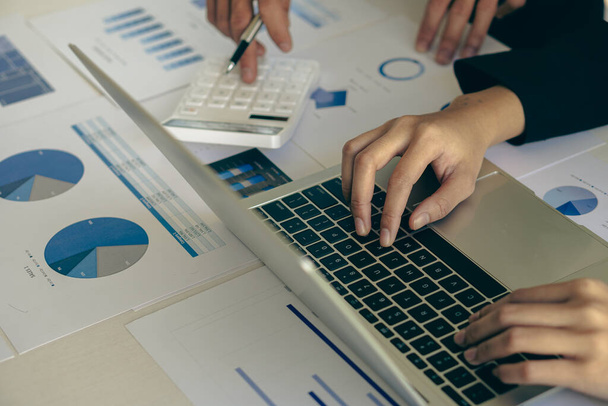 businessman hands working on laptop computer data analysis financial chart review online work concept - Foto, imagen