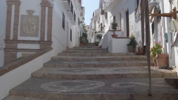 Andalusian whitewashed street at sunset, Frigiliana, Spain. Tilt - Footage, Video