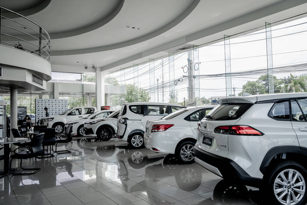 PHUKET, THAILAND - JUNE 05, 2022: Cars in showroom of dealership Toyota. - Fotoğraf, Görsel