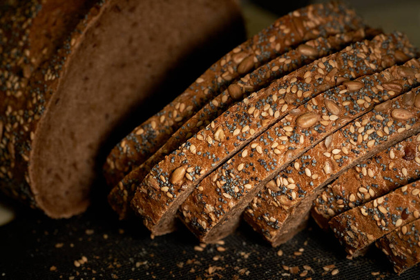Organic natural seed bread baked at home. High quality photo - Foto, Imagen
