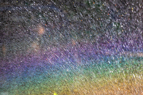 Photo of   abstract rainbow background, patterns of water droplets - 写真・画像
