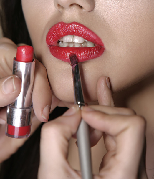 Make up, applying lipstick,stage studio real time shot - Photo, Image