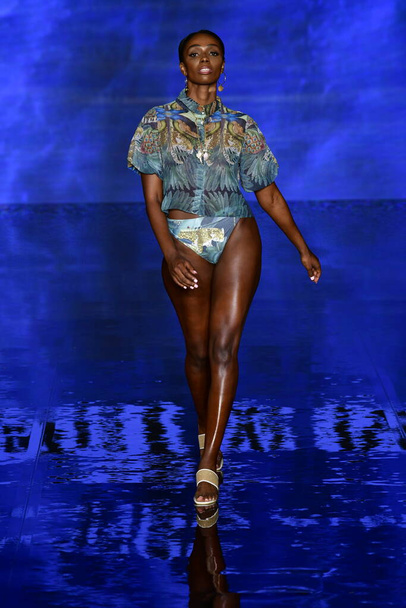 MIAMI BEACH, FLORIDA - JULY 09: A model walks the runway at the Fernando Alberto Atelier Show during Miami Swim Week Powered By Art Hearts Fashion at Faena Forum on July 09th, 2021 in Miami Beach, Florida.  - Foto, Imagem