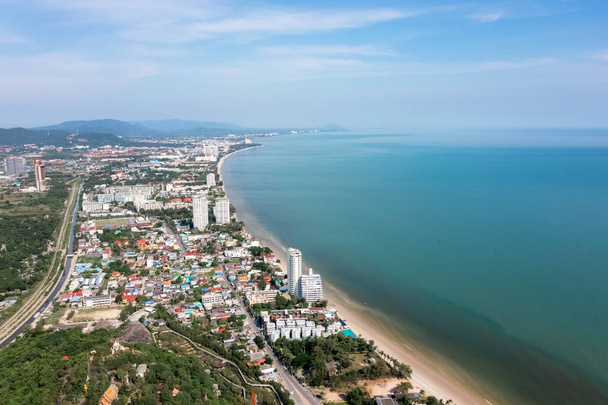 Hua Hin is a well known city with a welcoming atmosphere, surrounded by beautiful mountains and seascapes captured by a drone. - Photo, image