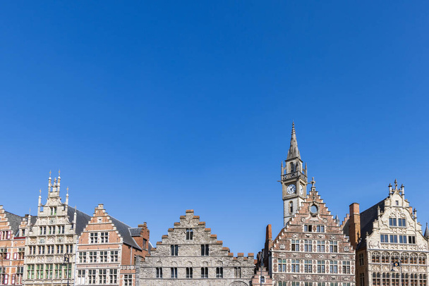 Ancient gable houses along the Korenlei in Ghent port city in northwest Belgium during a sunny day - Photo, Image