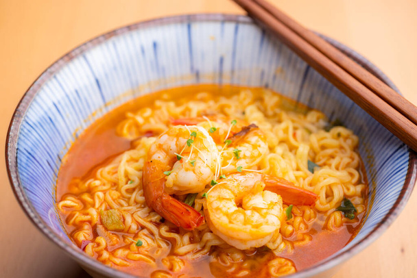 Korean spicy instant noodles with shrimp bowl - Photo, Image