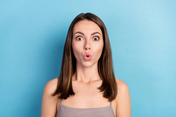 Portrait of attractive amazed worried girl sudden news reaction pout lips isolated over blue color background. - Foto, Bild