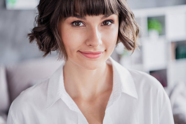 Cropped view portrait of attractive cheery brown-haired girl expert freelancer staying at home apartment indoors. - 写真・画像