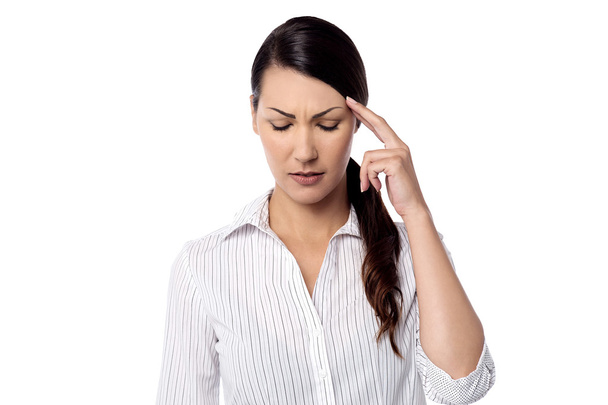 woman with headache touching her head - Foto, Imagem