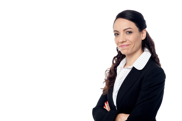 Business woman smiling with folded arms - Foto, Imagem