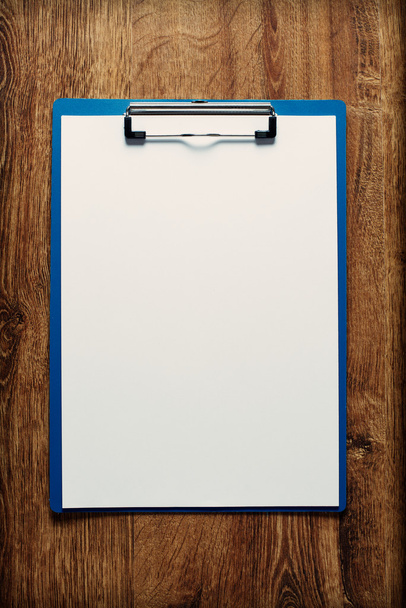 Clipboard with a blank sheet of paper - Photo, Image