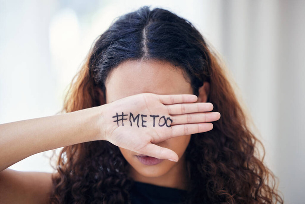 Shot of an unrecognisable woman with the hashtag me too written on her hand. - Fotó, kép