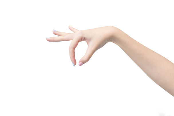 Női kéz pózol, vagy úgy viselkedik, mint egy pick valami elszigetelt fehér háttér - Fotó, kép