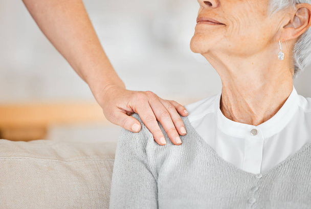 Closeup shot of an unrecognisable nurse comforting a senior woman at home. - Fotoğraf, Görsel
