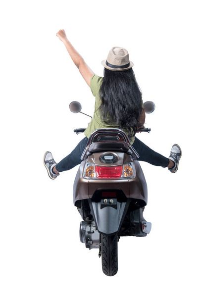 Rear view of Asian woman with a hat sitting on a scooter isolated over white background - Fotografie, Obrázek