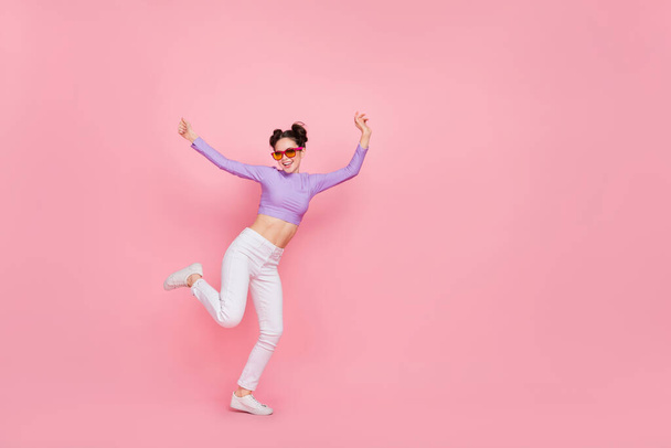 Full length body size view of attractive cheerful slender girl having fun disco club isolated over pink pastel color background. - Foto, Imagen