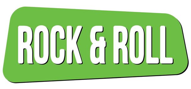 ROCK & ROLL text written on green trapeze stamp sign. - Photo, Image