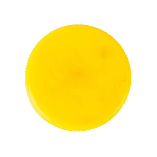 Kronkorken Kunststoff gelb isoliert auf weißem Hintergrund. - Foto, Bild