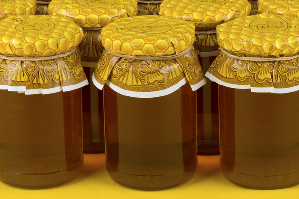 Composition with jars of honey - Photo, Image