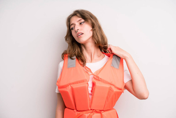 teenager girl. life jacket and boat concept - 写真・画像