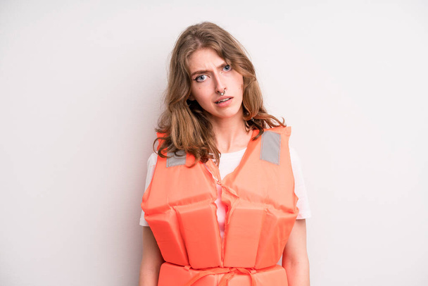 teenager girl. life jacket and boat concept - Photo, Image
