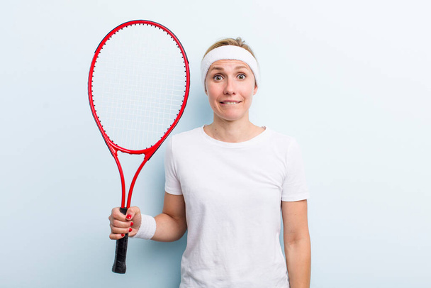 pretty blonde young adult woman. tennis sport concept - Photo, Image