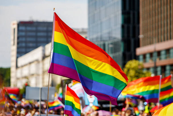 Lgbt pride rainbow flag during parade in the city - Photo, Image