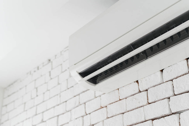 air conditioning on the white wall in the house - Fotó, kép