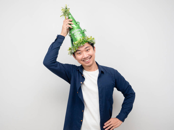 Man cheerful happy smile wearing green hat happy new year concept - Foto, Bild