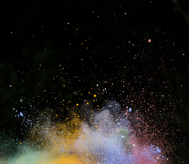 launched colorful powder over black - Fotó, kép