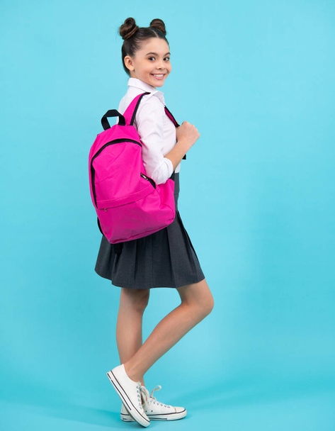 School and education concept. Back to school. Schoolchild, teenage student with backpack, isolated, copy space. Happy teenager, positive and smiling emotions of teen girl - Foto, immagini