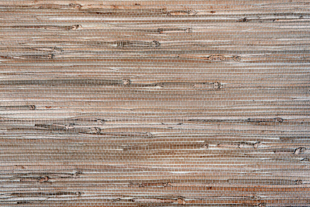 close up of the beige bamboo grass wicker wall background - Valokuva, kuva