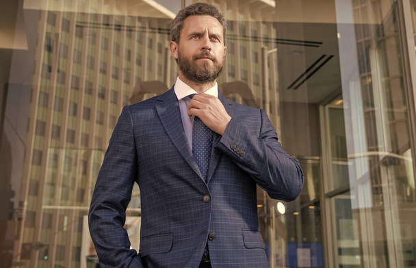 successful man in businesslike suit. entrepreneur outside the office. male formal fashion. professional unshaven ceo. mature businessperson in formal wear. business success. - Photo, Image